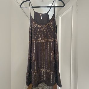 Super cute free people dress, missing a few sequins but can’t really notice